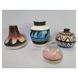 Four  signed Navajo pottery vases