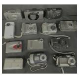 Group of Y2K digital and film cameras