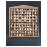 Collection of porcelain,  and Mets thimbles in a