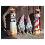 Vintage cast iron garden gnomes and lighthouses