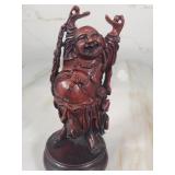Vintage wooden carved statues of  laughing