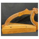 Carved wooden Celtic lyre harp