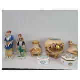 Four hand painted Japanese porcelain figures,