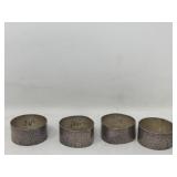 Four mid-century hand-hammered sterling silver