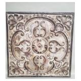 Embossed tin wall plaque