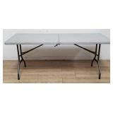 Plastic folding table