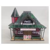 The Coca-Cola stained glass train station