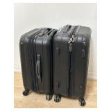 Pair of Travelers Club luggage