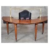 Antique burl wood and brass hunt table on casters