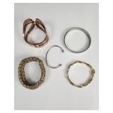Vintage bracelets: Trifari gold-tone and black