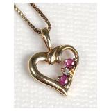 Sterling silver, diamond and red stone heart