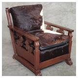 Vintage western-style mahogany and cowhide arm