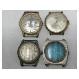 Group of four watch faces