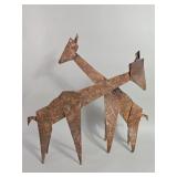 Rusted steel giraffe figures