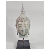 Bronze Thai Buddha head sculpture on wood base