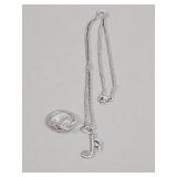 Sterling silver infinity heart ring and a music
