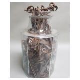 Group of skeleton keyes in a glass jar