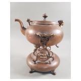 Antique copper and brass tea kettle with stand