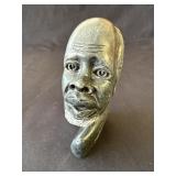 Signed African-style stone sculpture