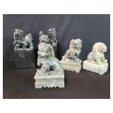 soapstone and chalk foo dog figures