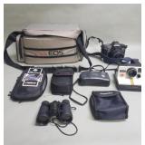 Group of cameras, camera bag and Bushnell