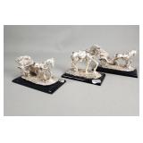 3 silver-coated resin horse figurines