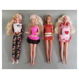 Four vintage Barbie dolls