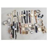 Group of men's and women's quartz wristwatches
