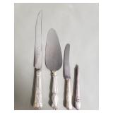 Silver handled knives and pen