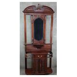Victorian-style mahogany hall tree with storage