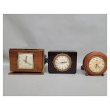 Three vintage electric table clocks