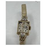 Vintage Lady Elgin 14k gold and diamond watch