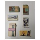 Vintage cigarette cards with boxes including 1938