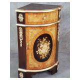 French-style corner cabinet with gold-tone accents