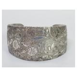 Silver plate bracelet with engraved floral motifs