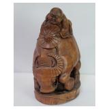 Vintage Chinese carved wood Daoist deity riding a
