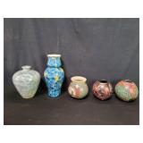Five signed pottery vases