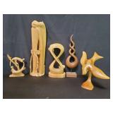 Five carved wood sculptures