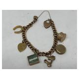 9k gold charm bracelet with hallmarks
