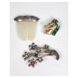 Vintage sterling silver brooches and a hat comb