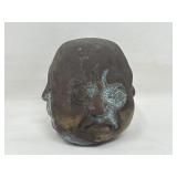 Four faced brass Buddha head figurine