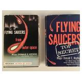 Pair of vintage books on flying saucer