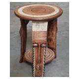 Handcrafted Fanti accent table with face motifs