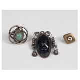 Silver single earrings and a brooch