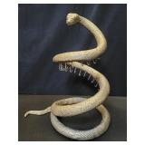 Warner Bros Ent. Inc. gold tone aluminum snake