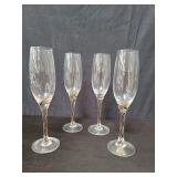 Four Lenox holiday ribbon Champagne glasses