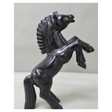 Carved obsidian horse figure