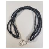 Multi-strand onyx necklace with sterling silver