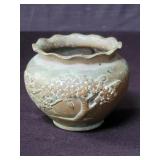 Vintage embossed brass vessel