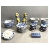 Group of Asian porcelain plates, planters, foo